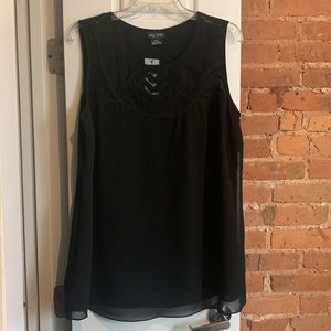 Flowy black sleeveless top with mesh design